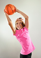 Image showing child exercising with a ball