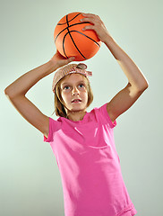 Image showing child playing basketball and throwing ball