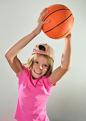 Image showing child exercising with a ball