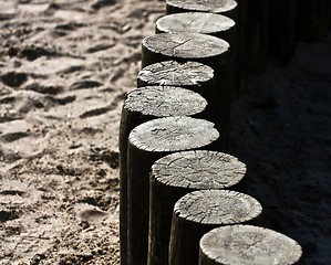 Image showing Wooden poles