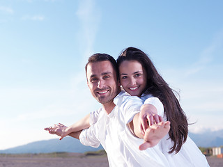 Image showing young couple  on beach have fun