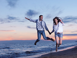 Image showing young couple  on beach have fun