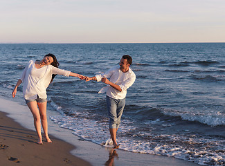 Image showing young couple  on beach have fun