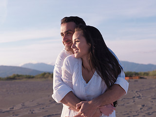 Image showing young couple  on beach have fun