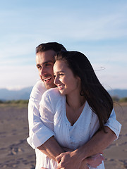 Image showing young couple  on beach have fun