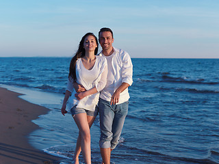 Image showing young couple  on beach have fun