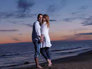 Image showing young couple  on beach have fun