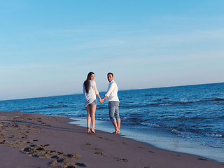 Image showing young couple  on beach have fun