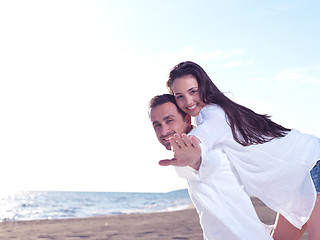 Image showing young couple  on beach have fun