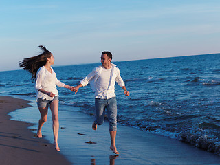 Image showing young couple  on beach have fun