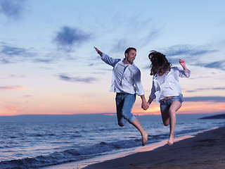 Image showing young couple  on beach have fun