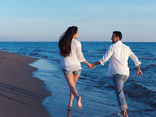 Image showing young couple  on beach have fun