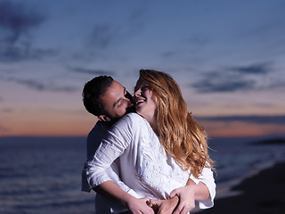 Image showing young couple  on beach have fun