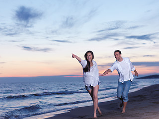 Image showing young couple  on beach have fun