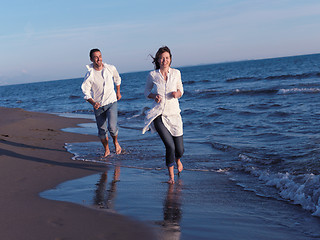 Image showing young couple  on beach have fun