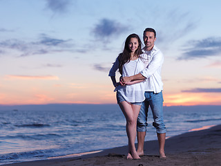 Image showing young couple  on beach have fun