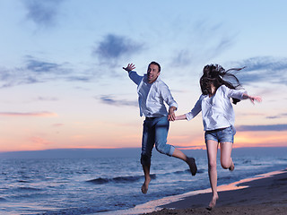 Image showing young couple  on beach have fun