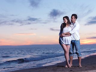 Image showing young couple  on beach have fun