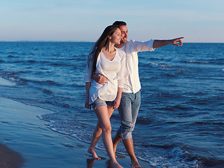 Image showing young couple  on beach have fun