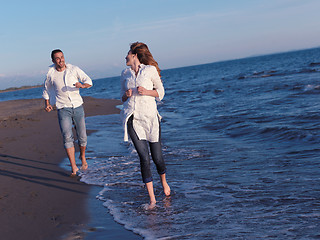 Image showing young couple  on beach have fun