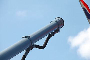 Image showing  gun barrel and flag