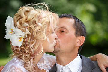 Image showing beautiful young wedding couple kissing