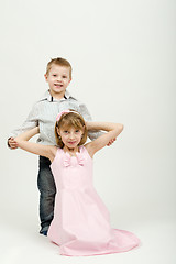 Image showing Studio portrait of siblings beautiful boy and girl