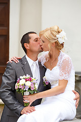 Image showing beautiful young wedding couple kissing