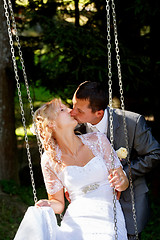 Image showing beautiful young wedding couple kissing