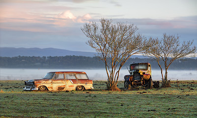 Image showing Vintage automobiles on a misty morning outback Australia