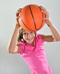 Image showing young basketball player makes a throw