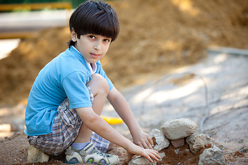 Image showing boy builds a house