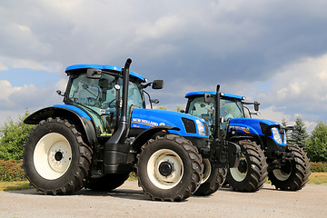 Image showing Two New Holland Agricultural Tractors