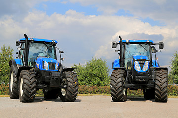 Image showing Two New Holland Agricultural Tractors