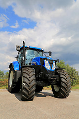Image showing New Holland T7.185 Agricultural Tractor on Display, Vertical Vie