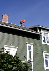 Image showing Man on a roof