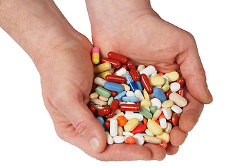 Image showing Hands with pills