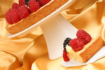 Image showing Custard tart with raspberries and blackberries