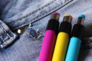 Image showing Jeans and pens
