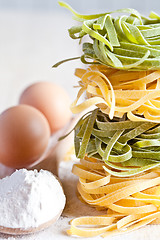 Image showing italian pasta tagliatelli, flour and eggs