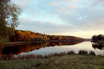 Image showing landscape with river and forest reflecting in it