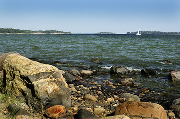 Image showing Finland, Baltic sea coast, sailboat on the horizon