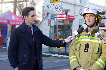 Image showing Superintendent Paul Jonstone updating media on fire and explosio