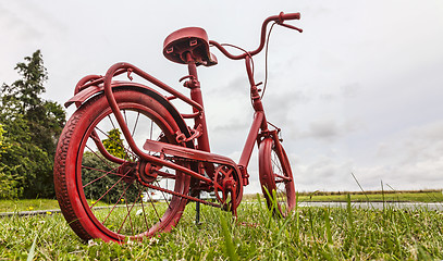 Image showing Red Bicycle on the Roadside