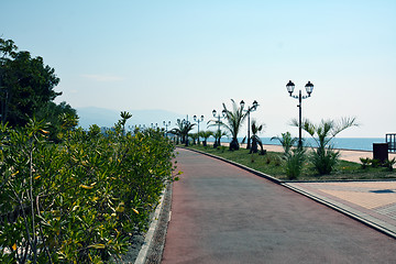 Image showing Sea promenade with the mountains in the far