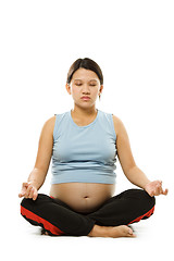 Image showing Pregnant woman meditating