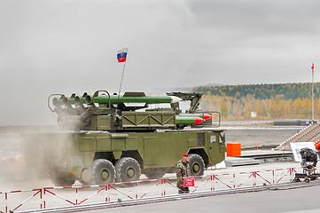 Image showing Buk-M1-2 surface-to-air missile systems in smoke