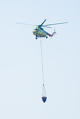 Image showing Helicopter MI-8 with antifire tank