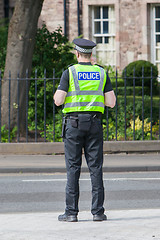 Image showing EDINBURGH, SCOTLAND - JULY 21: Police officer on guard duty near