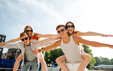 Image showing smiling couple having fun in city